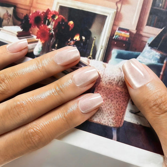 Melines short-square nude cat-eye nails close-up shows chic, durable finish.
