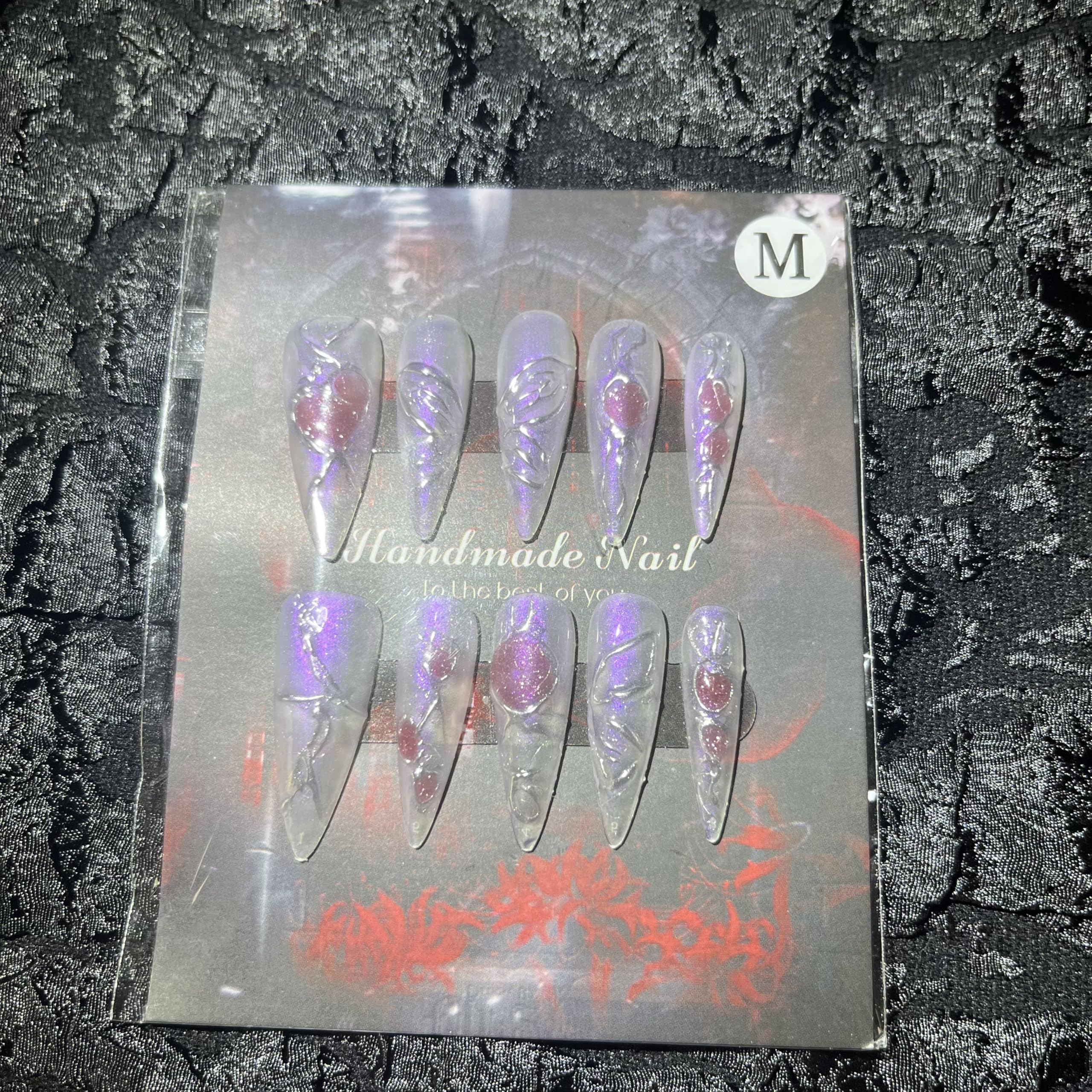 MellowBells nail set with rhinestones and charms adds shimmer and premium detail
