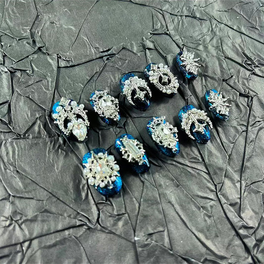 MellowBells palace blue cat eye long press-on nails for a quick glamorous manicure.