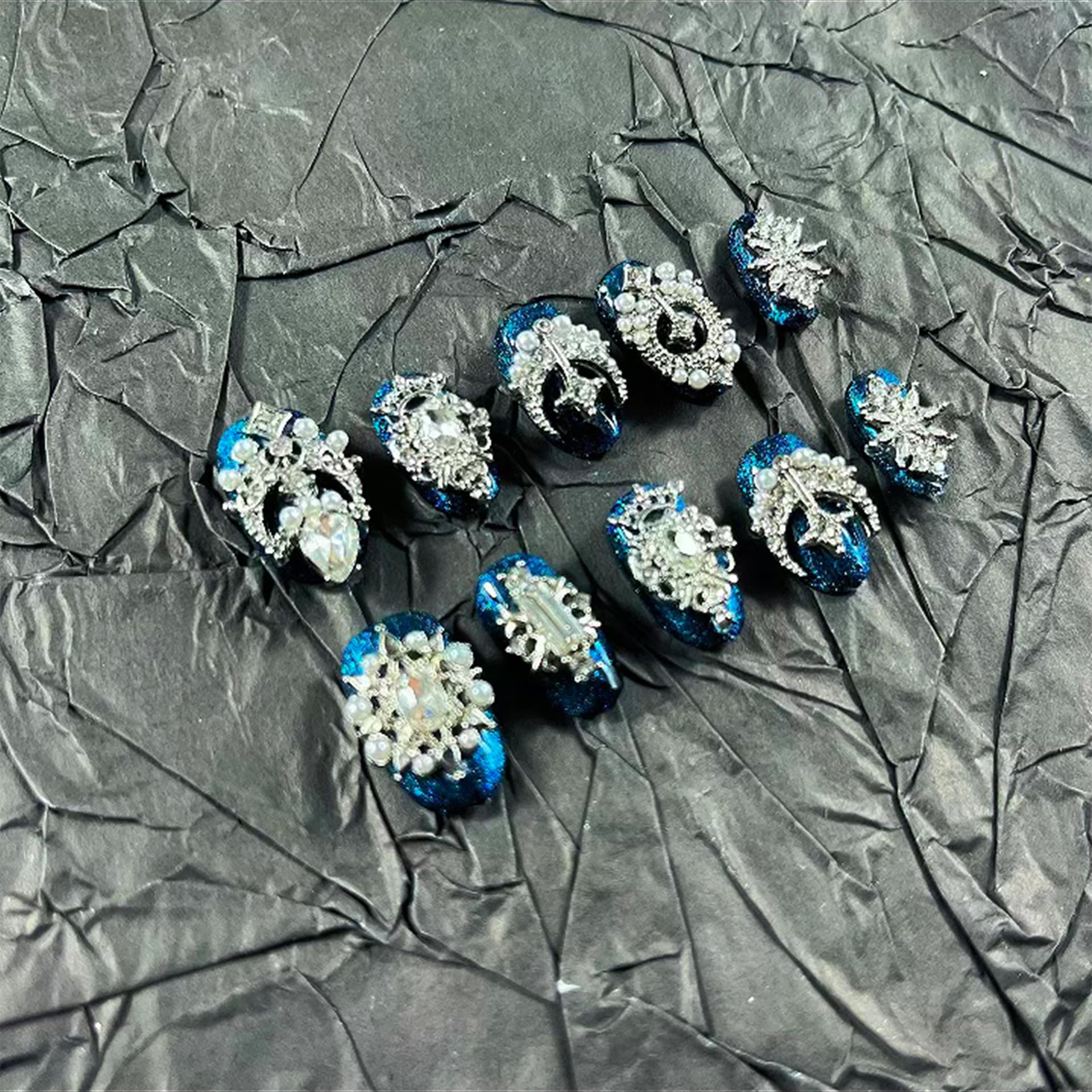 MellowBells palace blue cat eye nails, 18mm long, dramatic look for events.