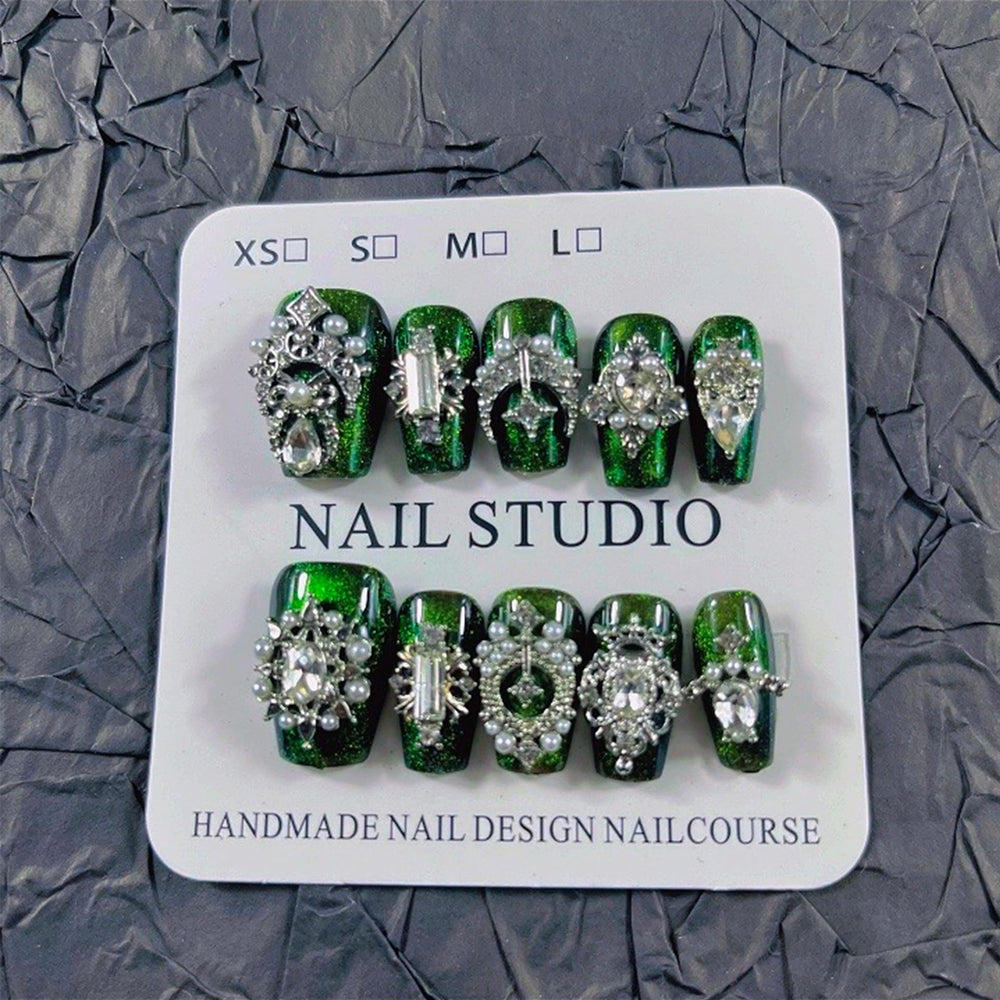 MellowBells handmade nails with rhinestones and crystals for party-ready glamour.