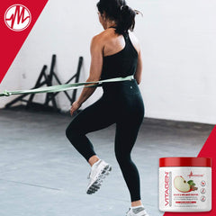 Lifestyle scene featuring Vitagen 240 g bottle on a wellness desk