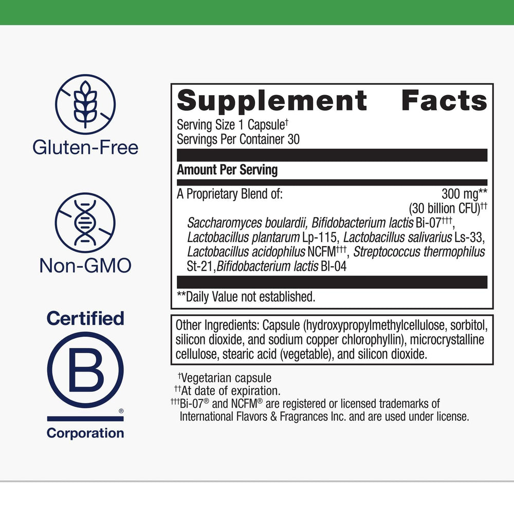 Metagenics UltraFlora Spectrum capsules being poured for easy daily digestive use.