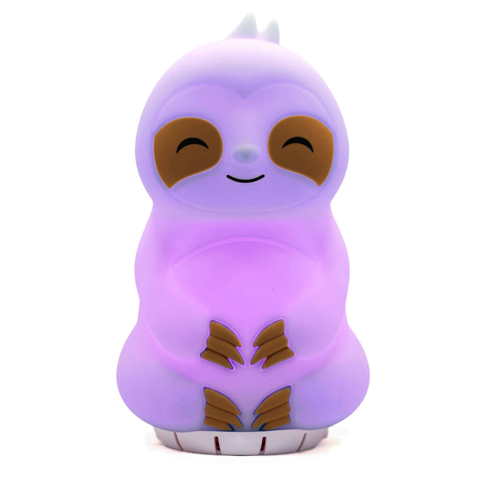 Mindsight Breathing Buddha on a desk in a cozy scene promotes calm breathing