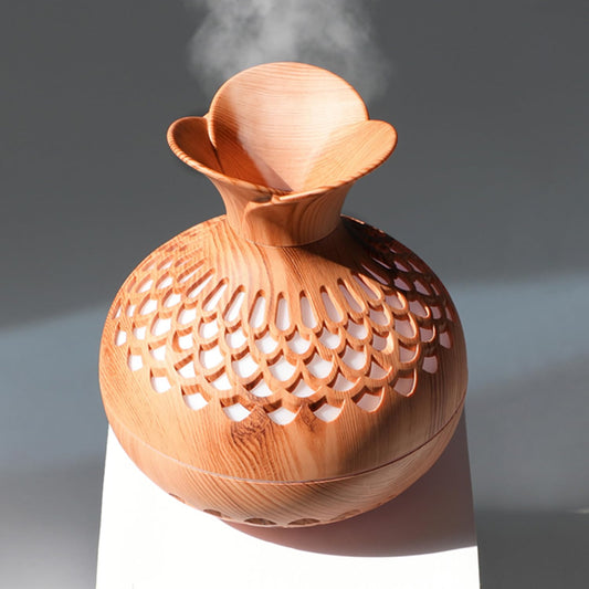 Compact 300ml mini humidifier on a desk with color LED night light