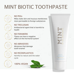 Close-up of toothpaste on toothbrush showing whitening effect