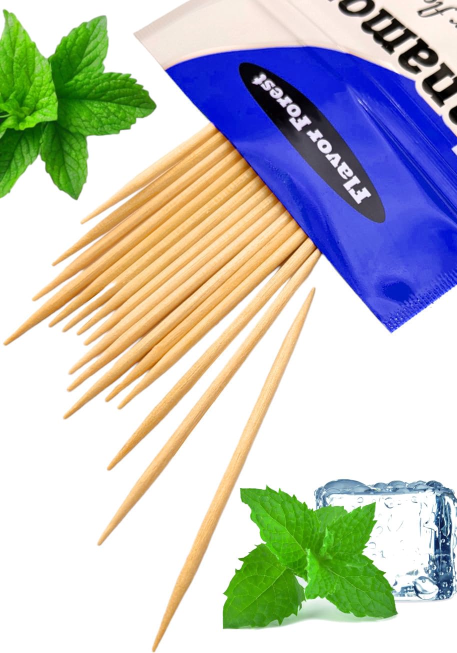 Close-up of double-pointed white birch toothpicks with mint flavor