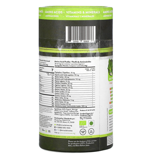Scoop of Moringa powder showing fine texture