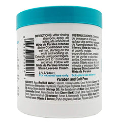 Conditioner bottle highlights coconut oil for smooth, frizz-free ends.