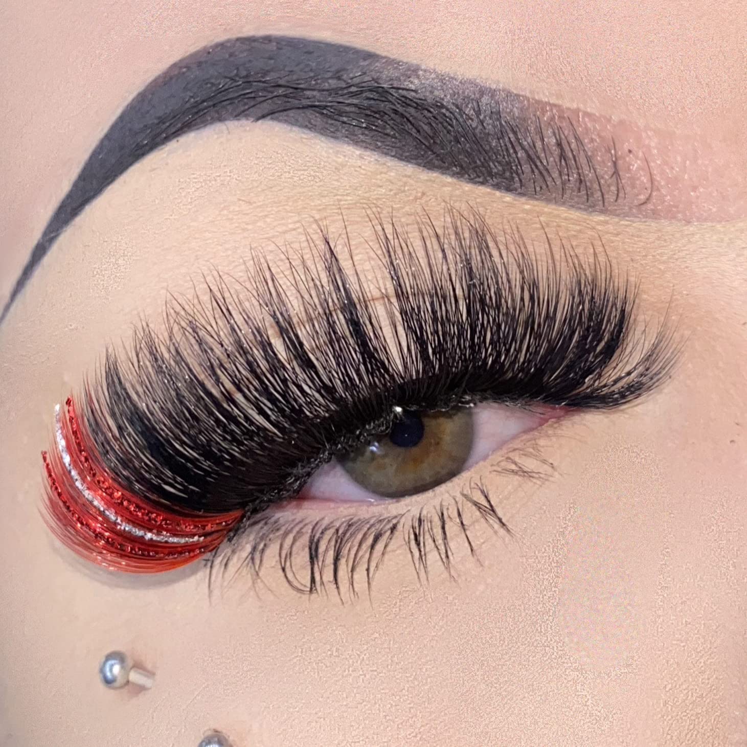 Miss Kiss dramatic red-tipped lashes for bold evening style