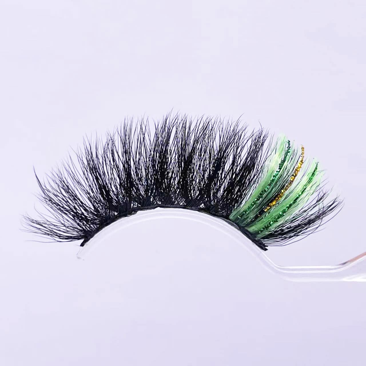 Miss Kiss lashes featuring green glitter end highlight for eye-catching drama