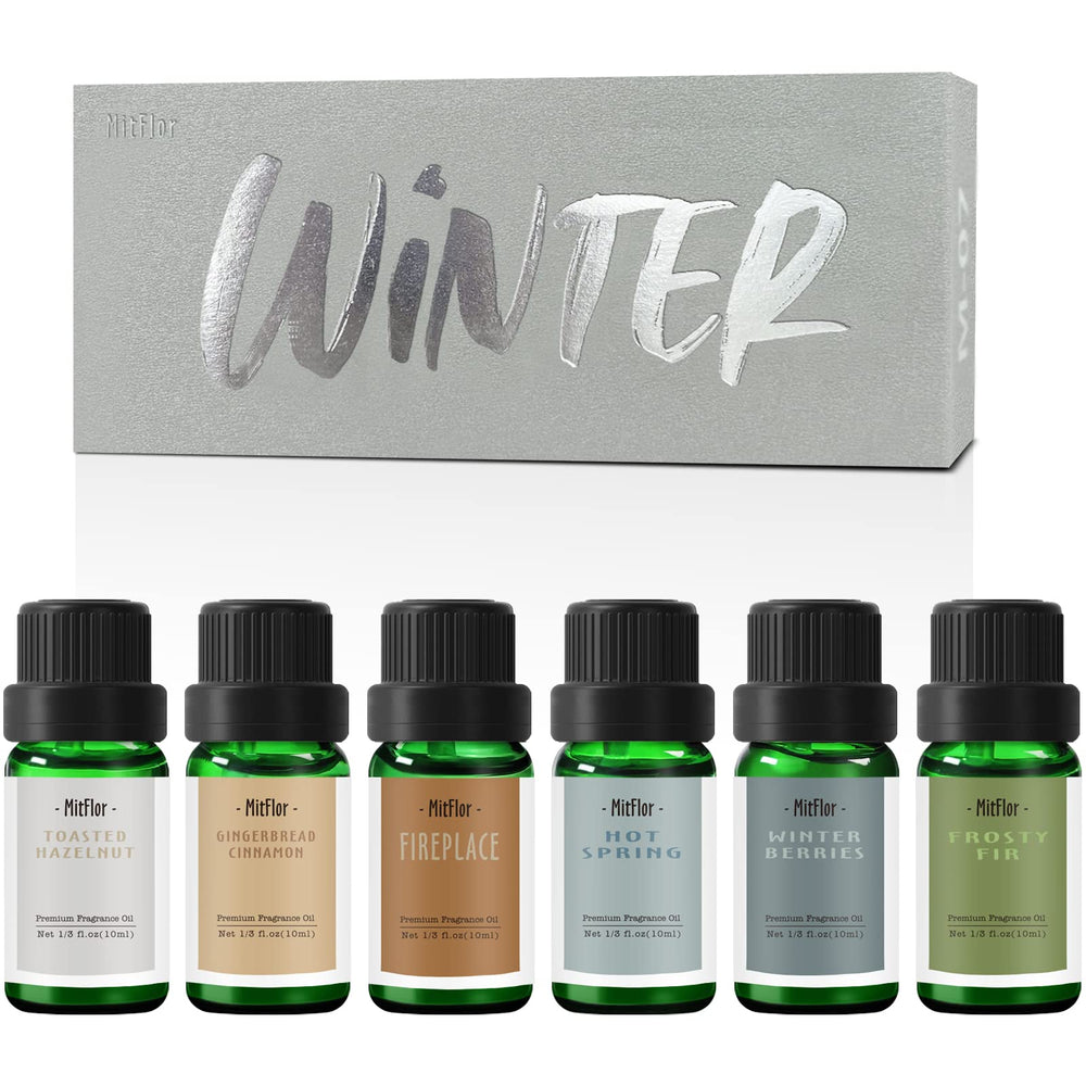 MitFlor winter essential oils six 10ml bottles arranged in a row