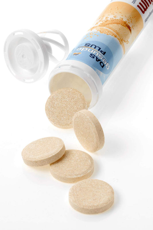Close-up of orange-flavored calcium effervescent tablets