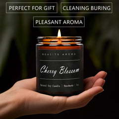 Close-up of cherry blossom scented candle with natural cotton wick