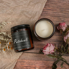Living room setup with MOASITN patchouli candle on a coffee table