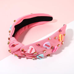 mokkia conversation heart earrings in candy colors add playful accents