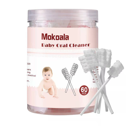 Baby tongue cleaner being used on an infant