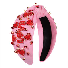 MOLOCH valentine heart headband with beaded details for festive styling