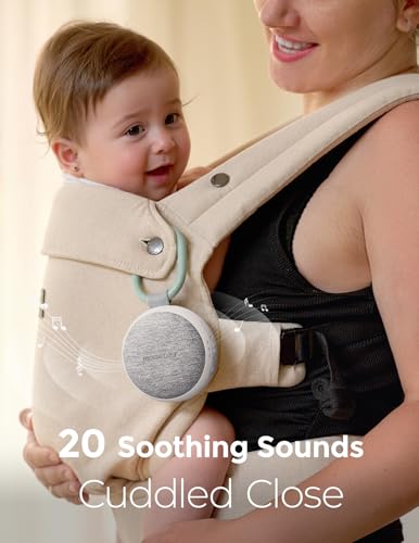 Momcozy amber night-light guides feeds without fully waking baby.