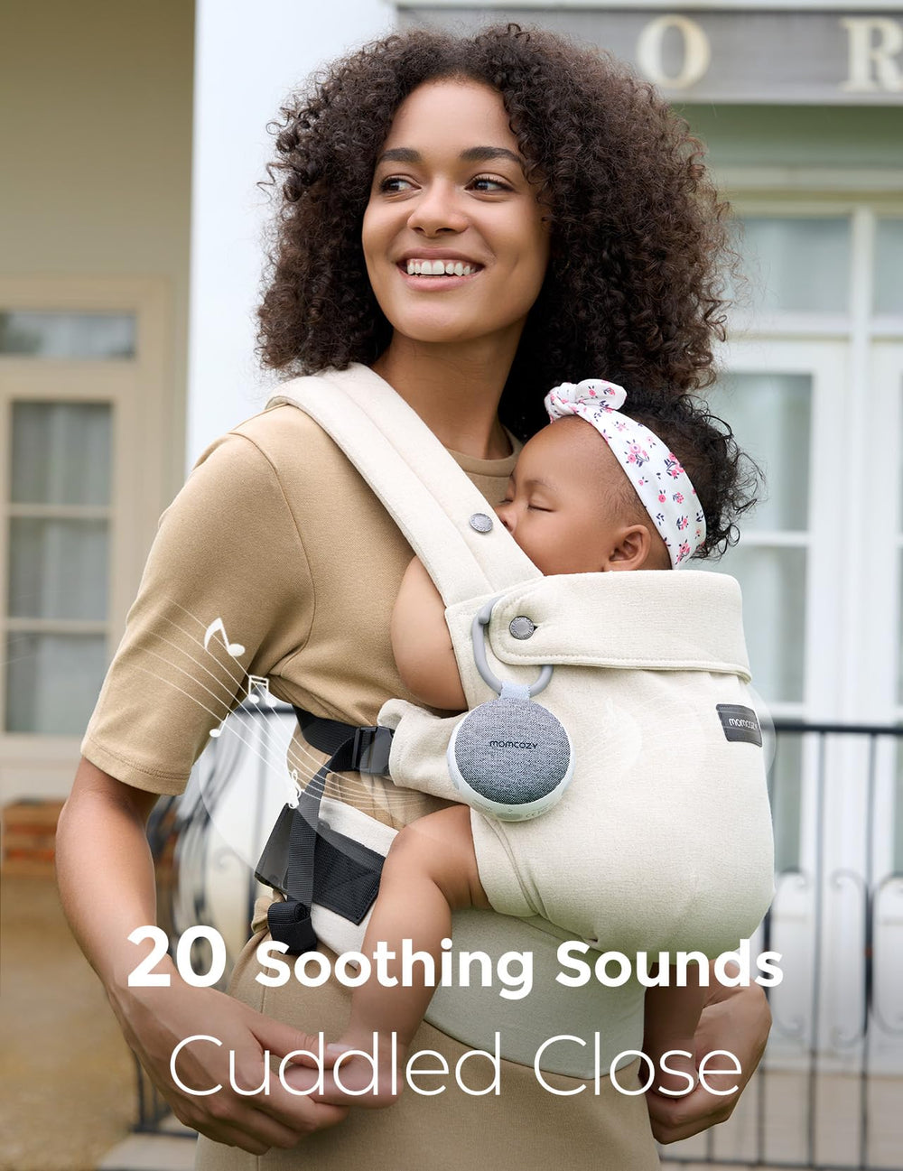 Momcozy amber nightlight in use provides soft illumination for nighttime feeds.
