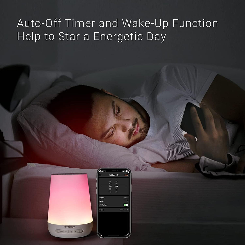 Momcozy remote control app image demonstrates convenient bedtimes via smartphone.