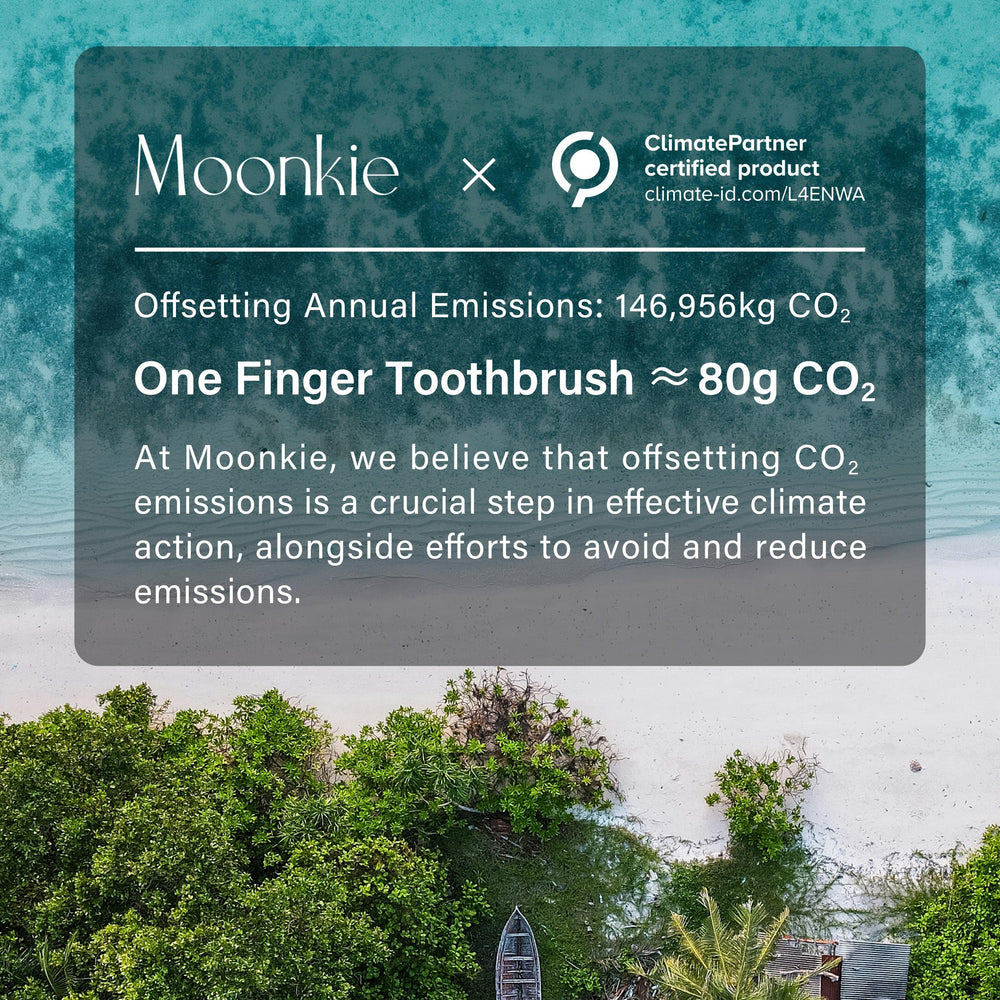 Moonkie finger toothbrush mint – in use by baby hand