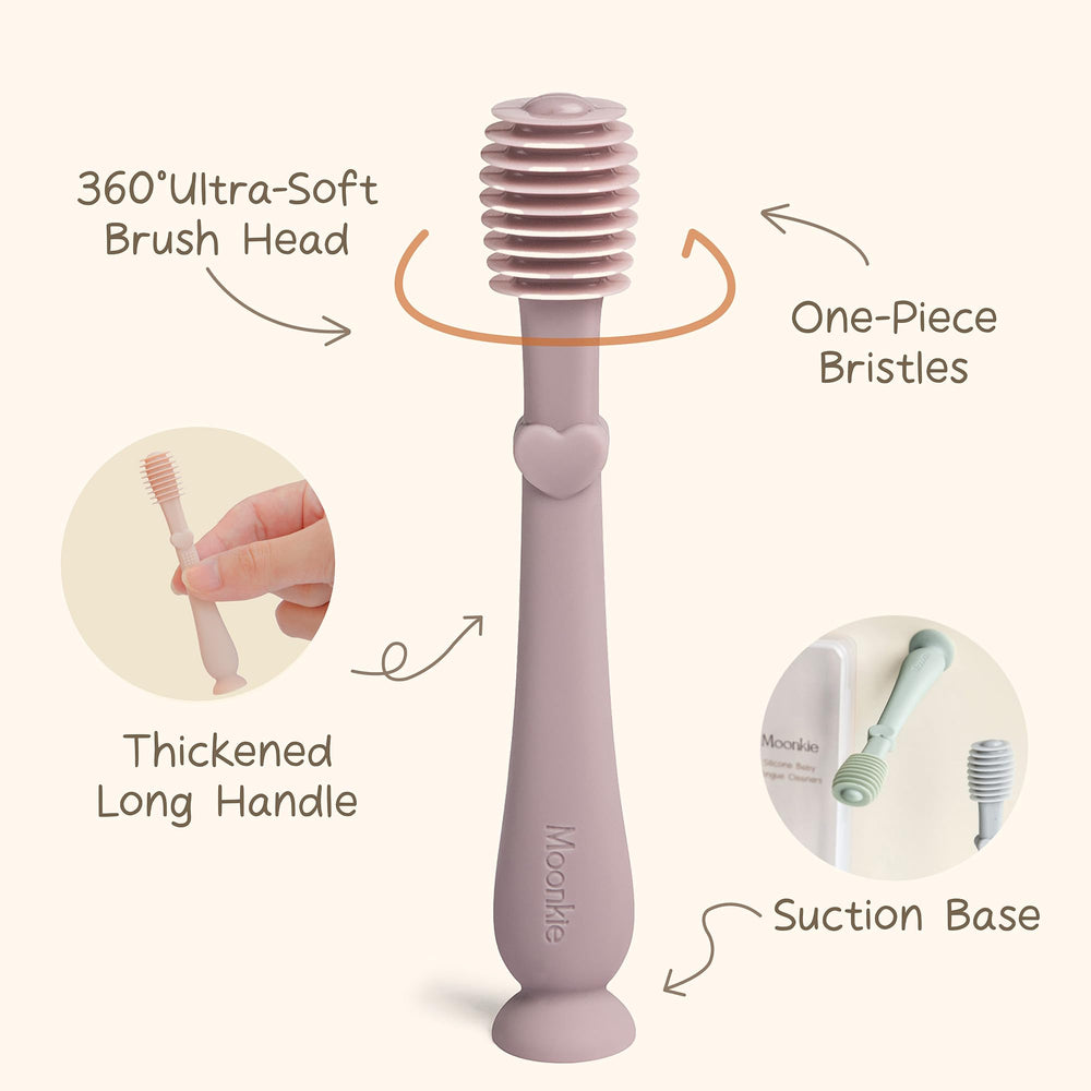 Baby tongue cleaner being used safely on infant mouth - silicone design