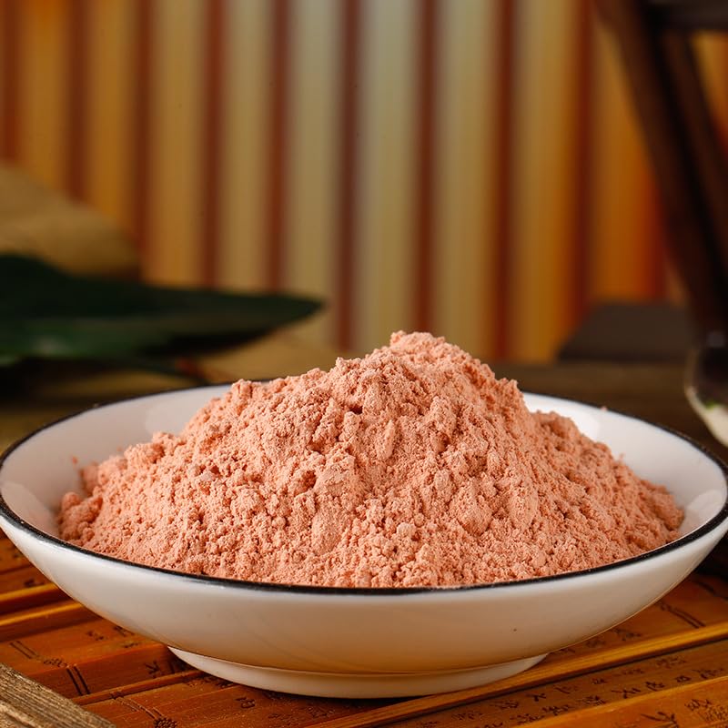 Hawthorn powder being scooped for serving