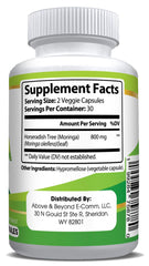 Close-up of Moringa powder capsules showing 800 mg per capsule