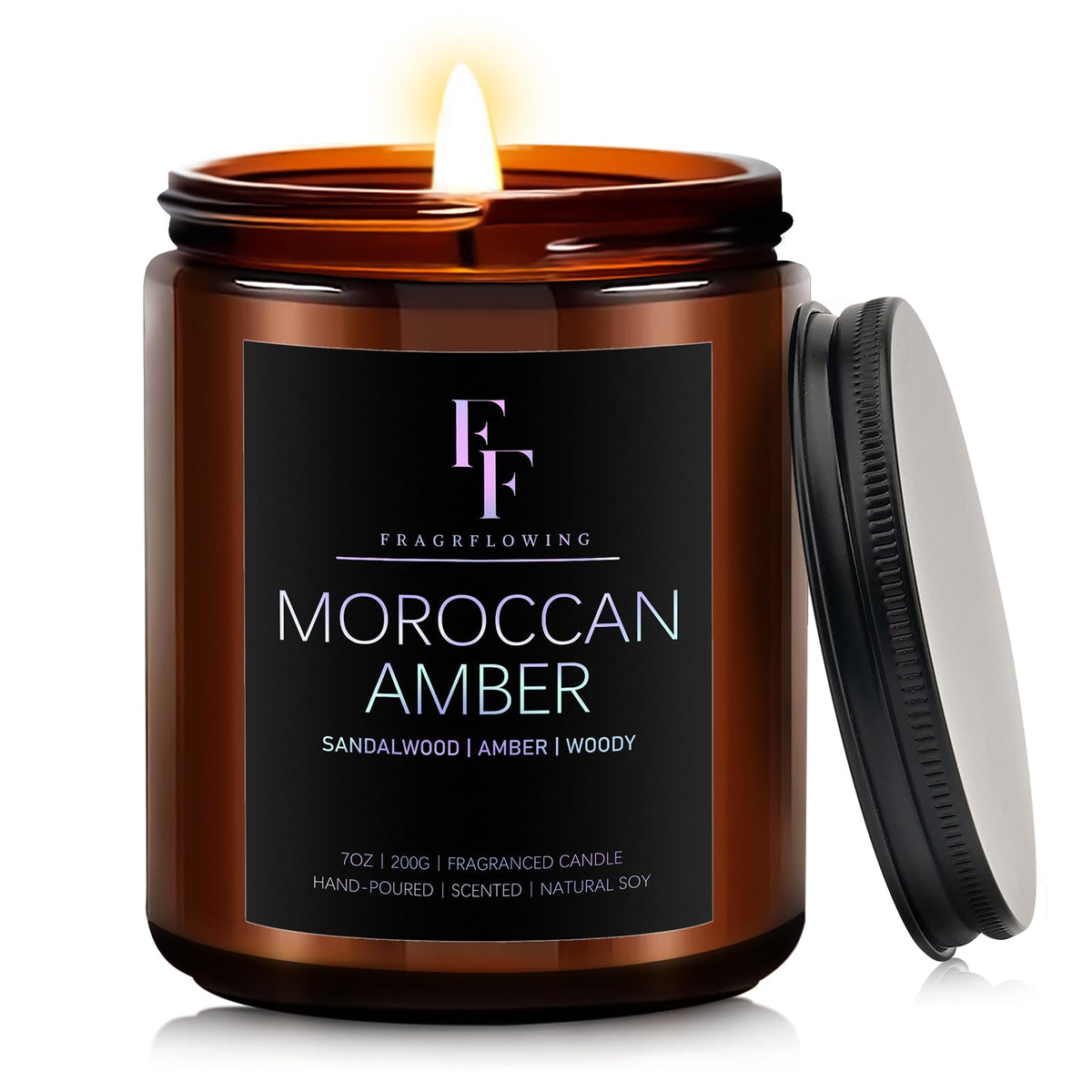 7oz Moroccan Amber scented candle in a jar with warm glow