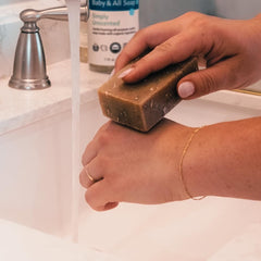 Castile soap bar on a clean surface