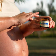 Creamy herbal balm texture of Motherlove C-Section Cream