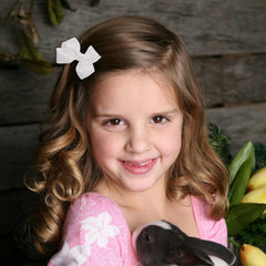 Motique hair bows with sturdy clips, ideal for active kids.