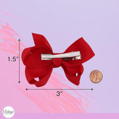 Motique small red bows add a cheerful accent to school outfits.