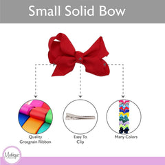 Motique red bows featured in a gift-ready set for girls.