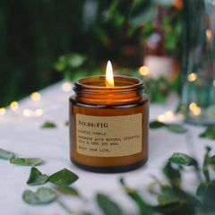 Rose Garnetberry Fig candles in amber jars