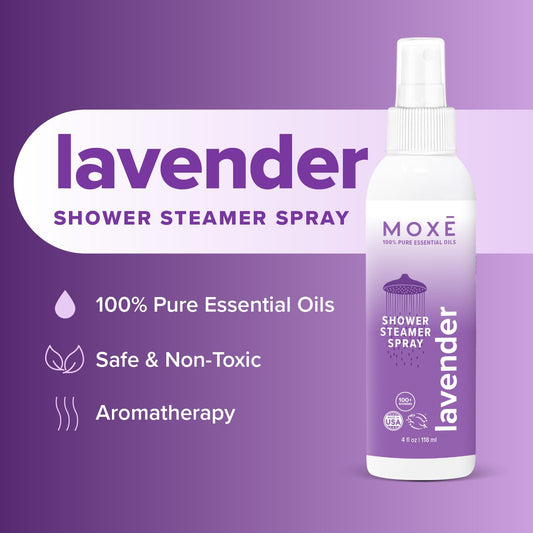 Shower mist spray dispersing in shower with lavender scent