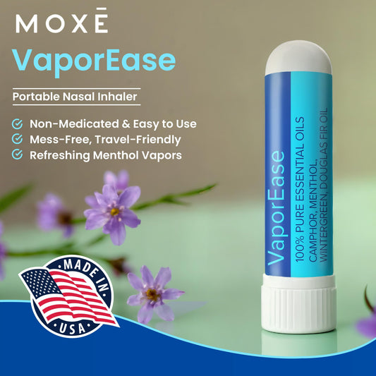 MOXE VaporEase in-use shown during travel for easy breathing and menthol relief.