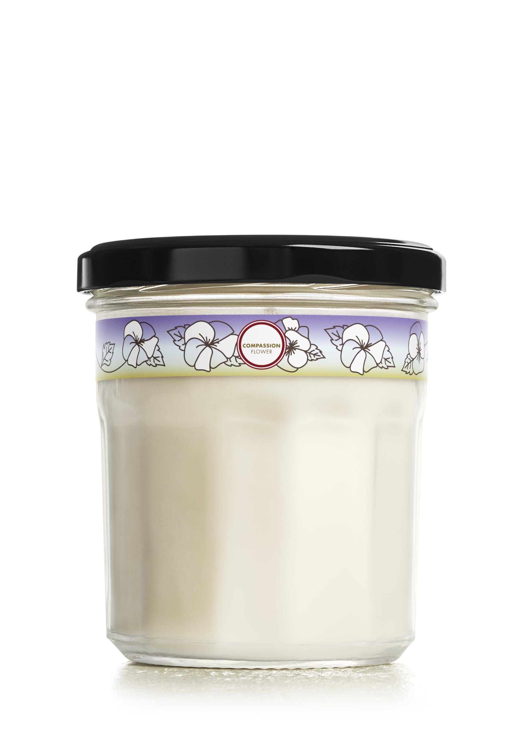 Mrs. Meyer's Clean Day Compassion Flower candle jar for long-lasting room fragrance.