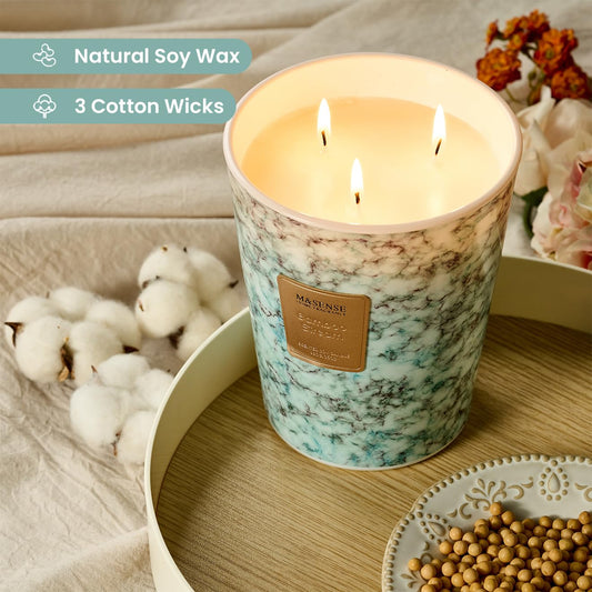 Close-up of three lead-free cotton wicks burning in the candle