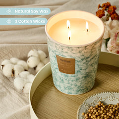 Three-wick fresh sage citrus scented candle close-up