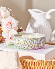 Apple scented candle glowing in a living room setting
