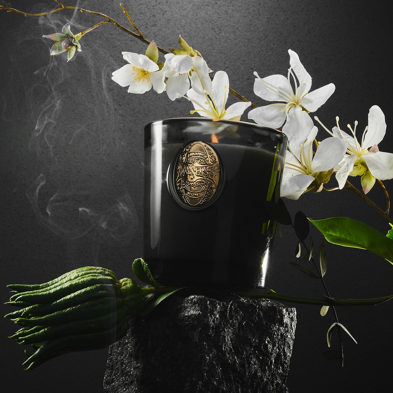 Candle creating a relaxing ambience in bedroom or office