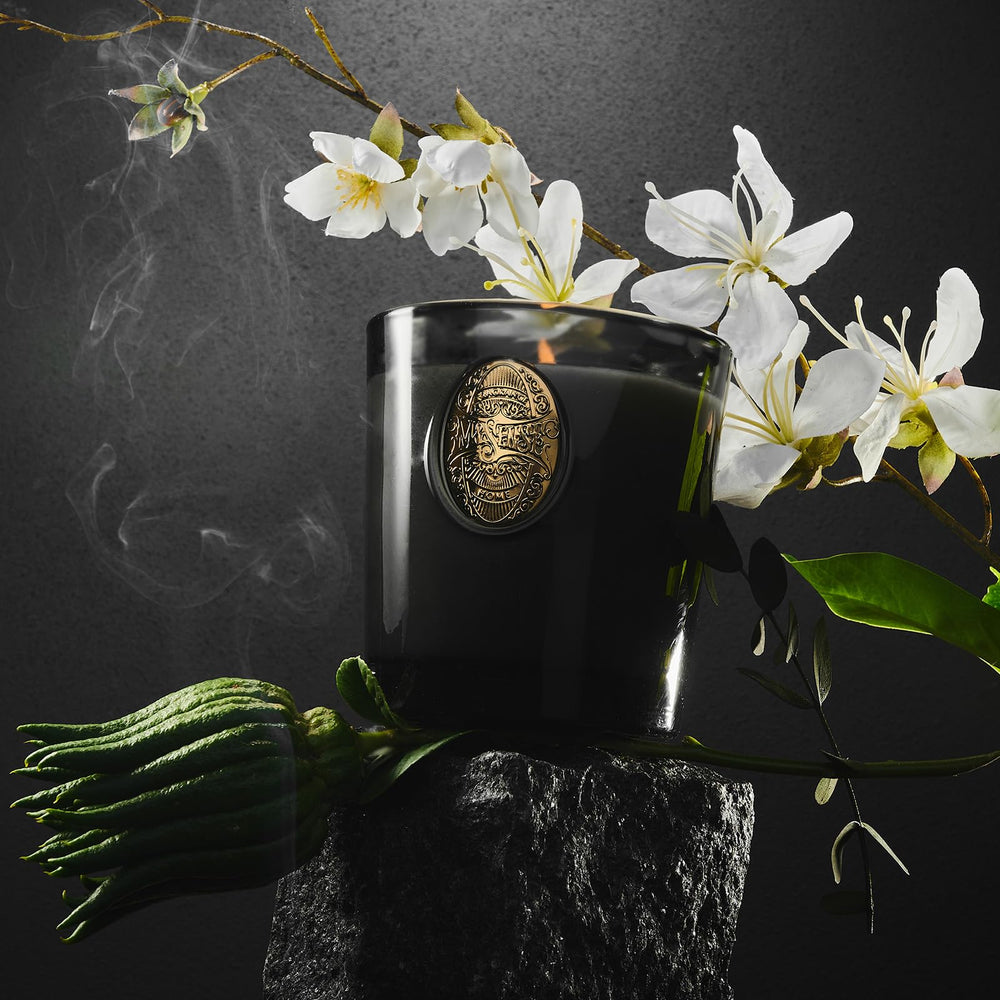 Candle creating a relaxing ambience in bedroom or office