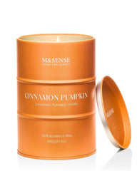 Close-up of M&SENSE Cinnamon Pumpkin scented candle in glass tin