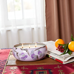 Close-up of three cotton wicks burning in the candle