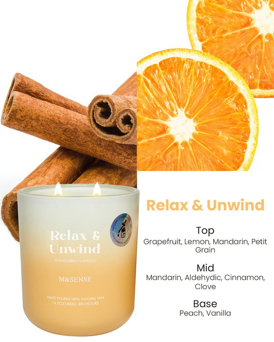 Close-up of Mandarin and Vanilla essential oils used in the candle