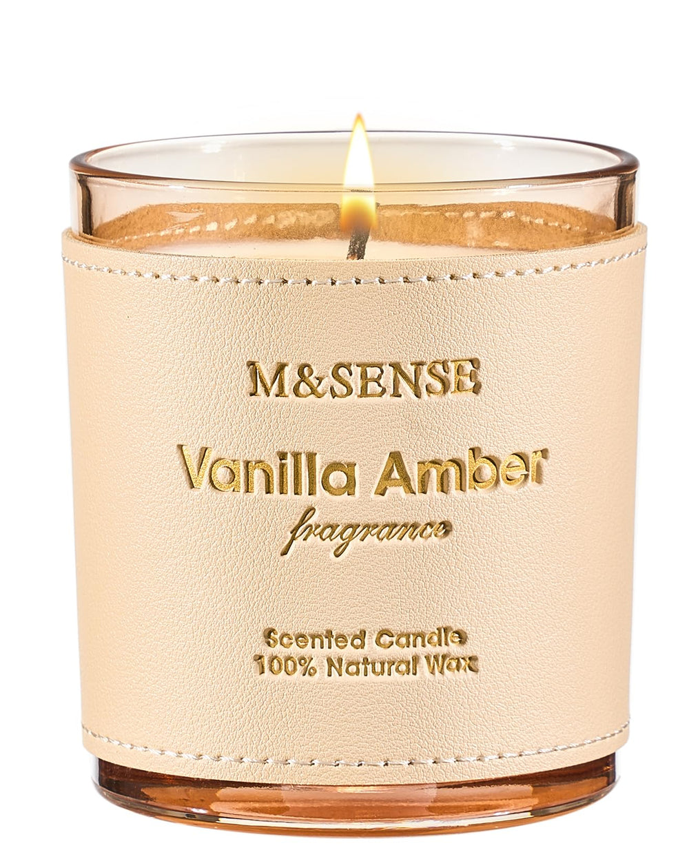 Close-up of M&SENSE Vanilla Amber scented candle with hand-stitched leather sleeve