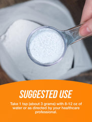Serving scoop of MSM powder showing dose