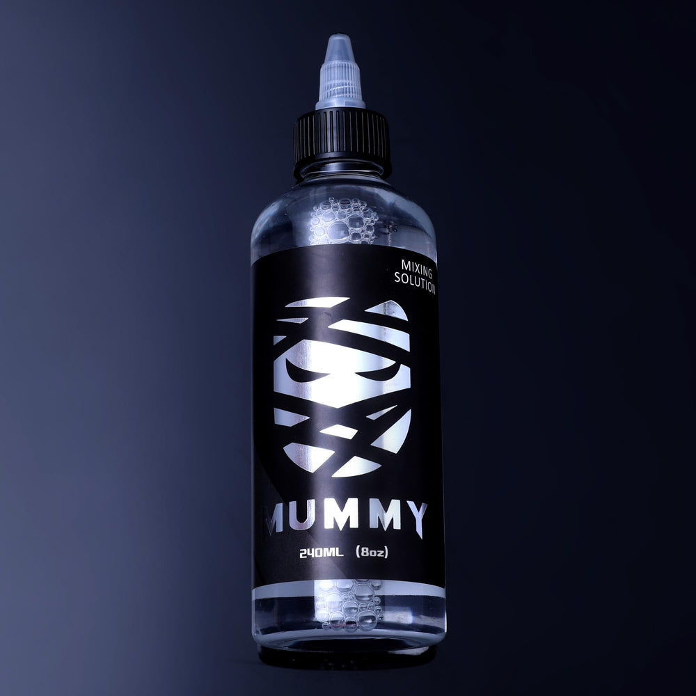 Mummy Tattoo Ink Mixing Solution in use blends inks to create smooth washes